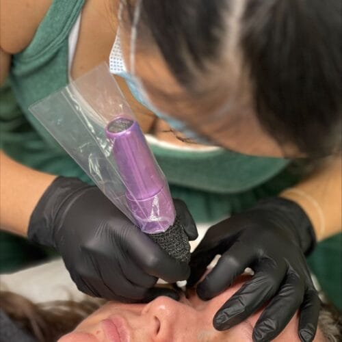 Ley of DAELA Scottsdale working on a client.